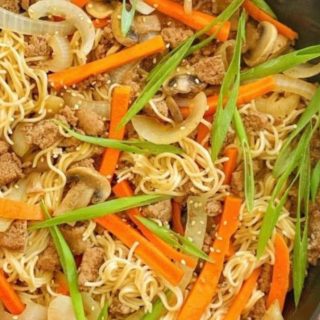 A skillet of ramen noodle stir fry.